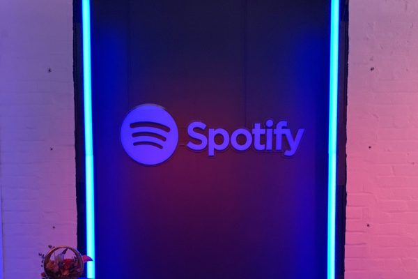 neon lit sign with Spotify logo